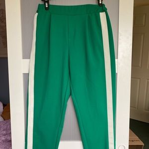 Bright green fashion pants with white stripe